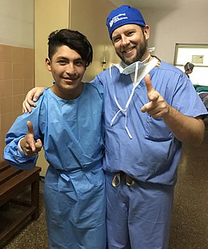 Dr Brown with older patient who needs surgery